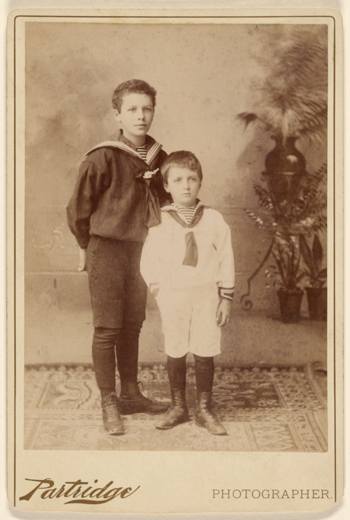Partridge:[Two young boys standing, both wearing sailor-type, Poster Print Wall Art