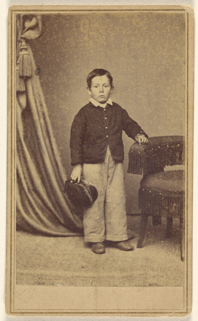 H. Jaeger & Company:[Unidentified little boy standing, holdi, Poster Print Wall Art