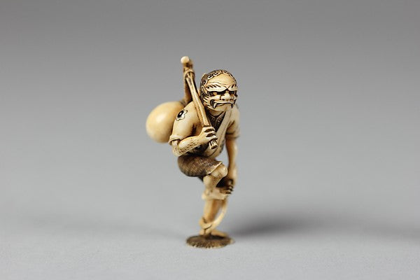 Netsuke of a Demon Carrying a Gourd on His Back 19th cent, Poster Print
