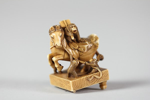 Netsuke of a Horse on a Pedestal with Monkeys Playing About 19,16x12"(A3) Poster
