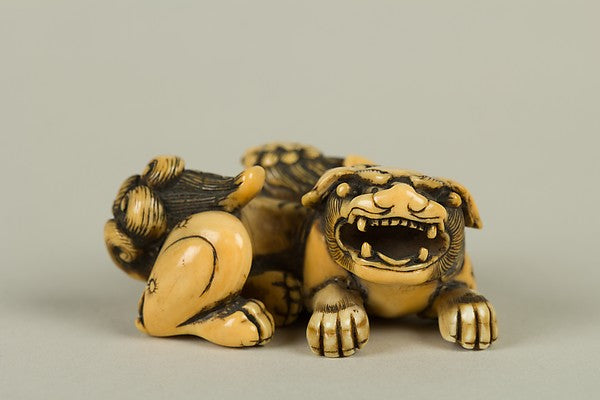 Netsuke of Lion with a Cub 19th cent, Poster Print