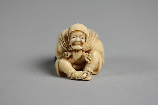 Netsuke of Old Man Carrying a Bag of ?ni 19th cent, Poster Print