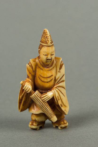 Netsuke of a Boy Carrying an Umbrella 18th cent, Poster Print