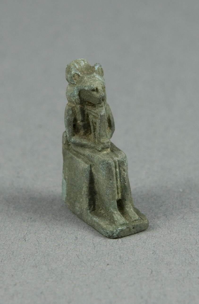 Amulet of a Seated Lion-headed Goddess Holding a Sistrum, possibly Bastet by Egyptian, 23x16"( A2 size) Poster Print