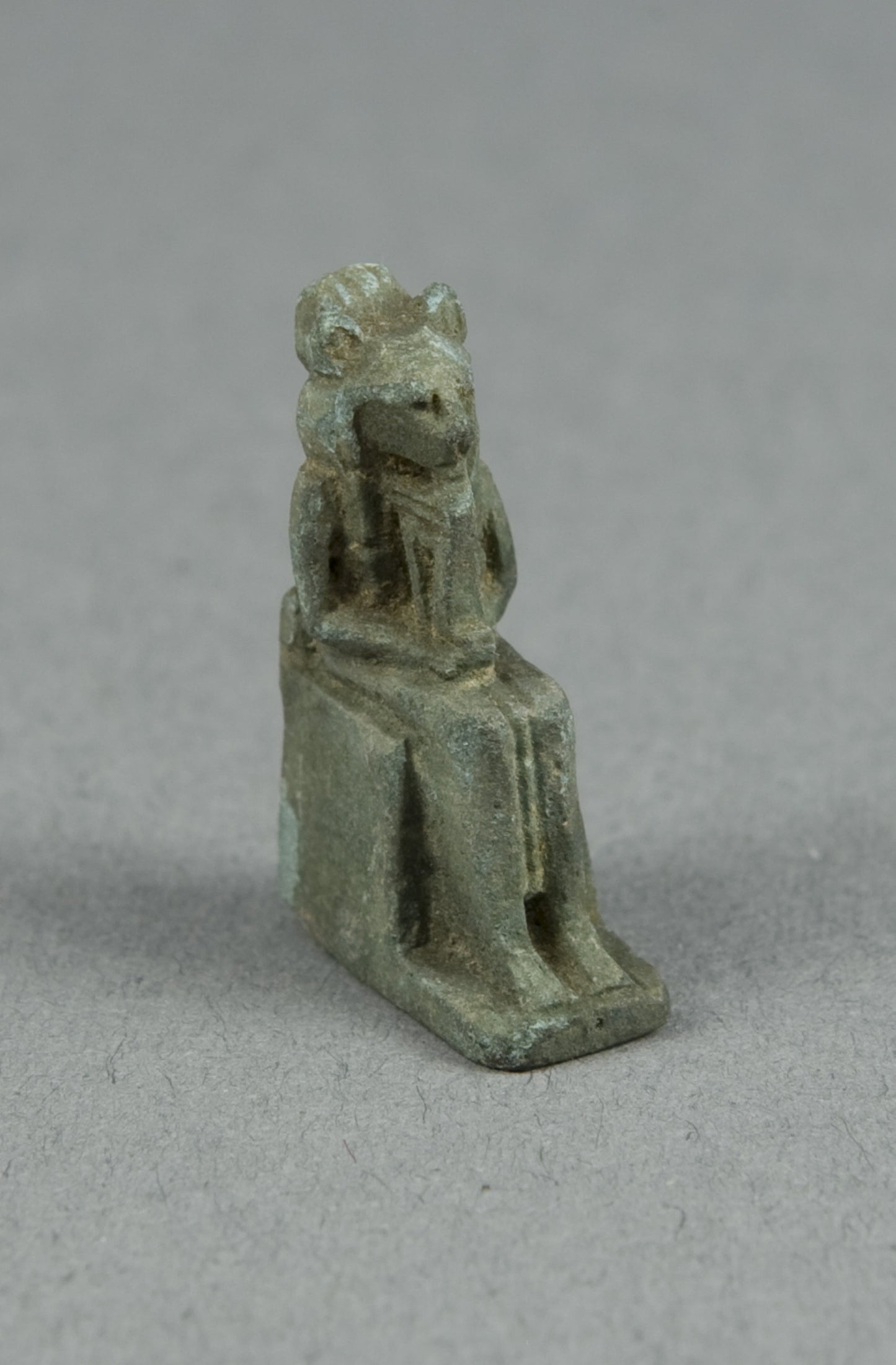 Amulet of a Seated Lion-headed Goddess Holding a Sistrum, possibly Bastet - Egyptian, Poster Print Wall Art