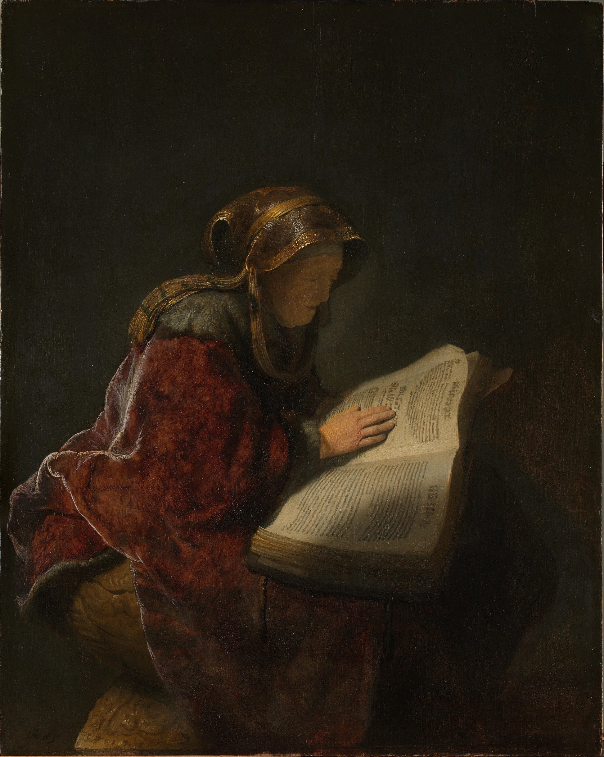Old Woman Reading, Probably the Prophetess Anna – Rembrandt van Rijn (mentioned on object) Vintage Religious Scene Art Print | Wall Art Poster