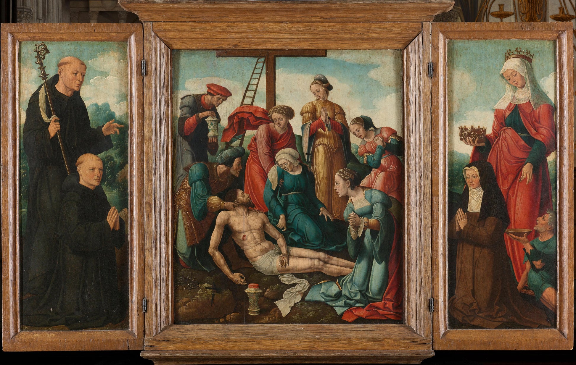 Triptych with the Lamentation of Christ (center), flanked by the male Donor with Saint Benedict (left, inner wing) and female Donor with Saint Elizabeth of Thuringia (right, inner wing) – toegeschreven aan Cornelis Cornelisz. Buys (II) Vintage Art Print |