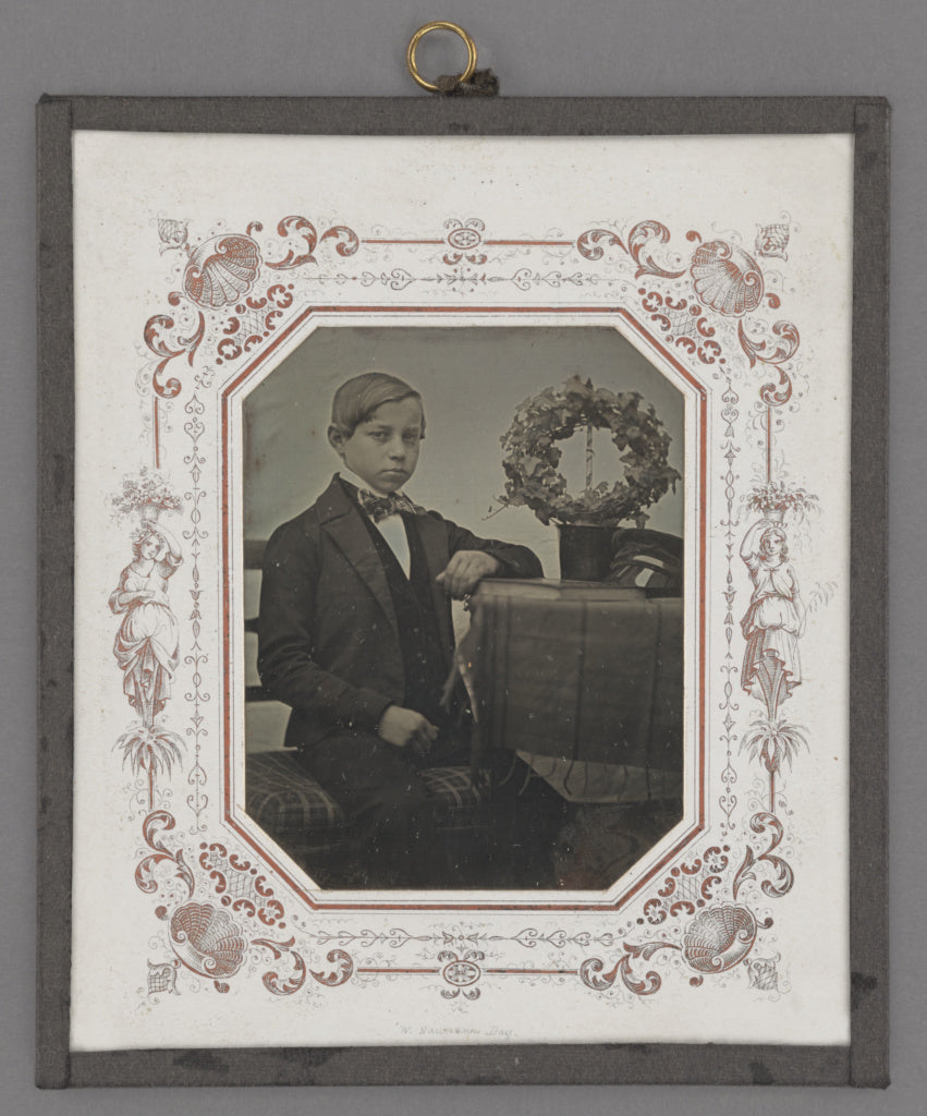 W. Nauman:[Portrait of a Young Boy Posed by Table with Wreat, Poster Print Wall Art
