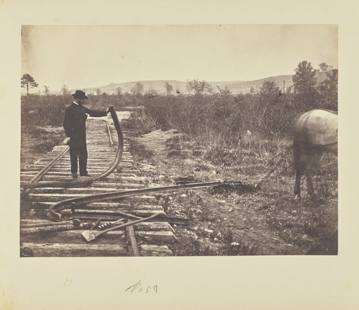 A.J. Russell:[Man holding bent rail],16x12