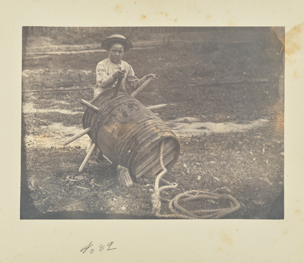 A.J. Russell:[Child leaning against a barrel anchor],16x12"(A3)Poster