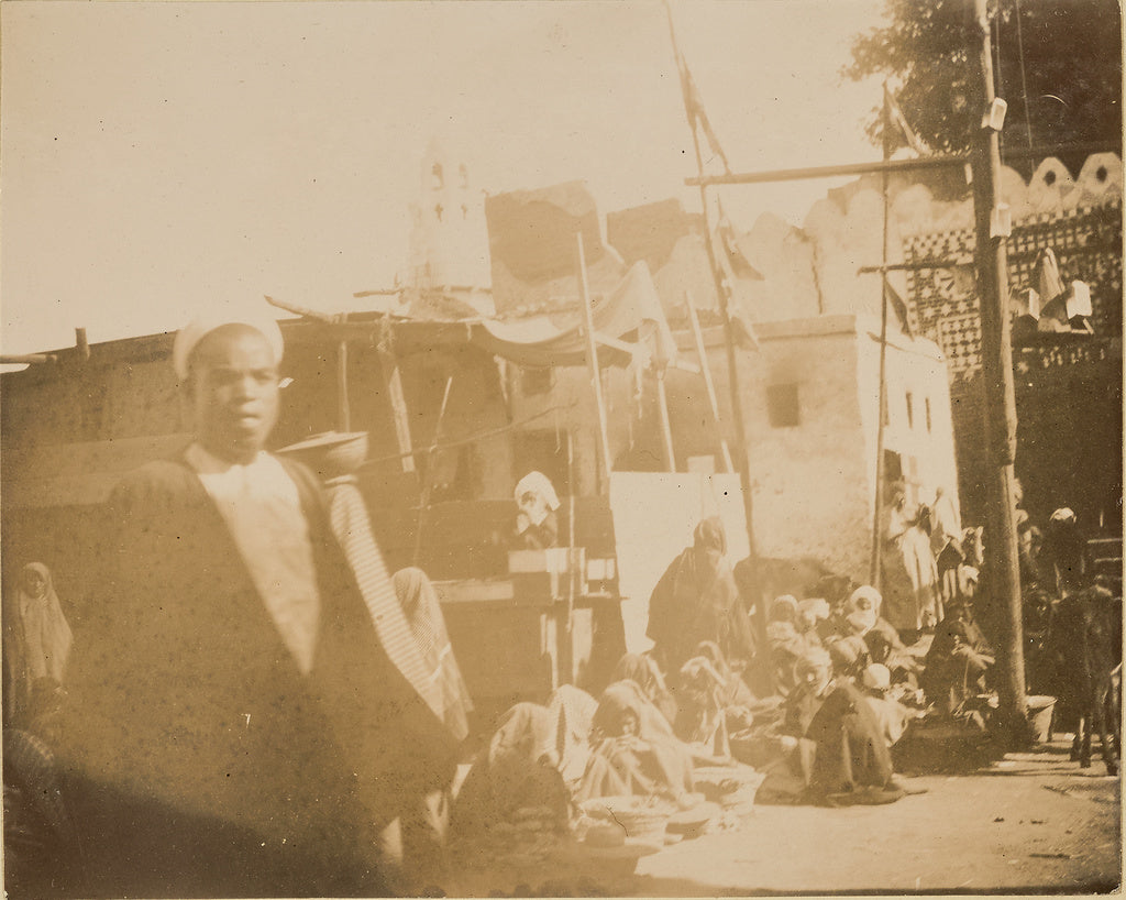 Unknown:[Group of people sitting on ground in a row], Poster Print Wall Art