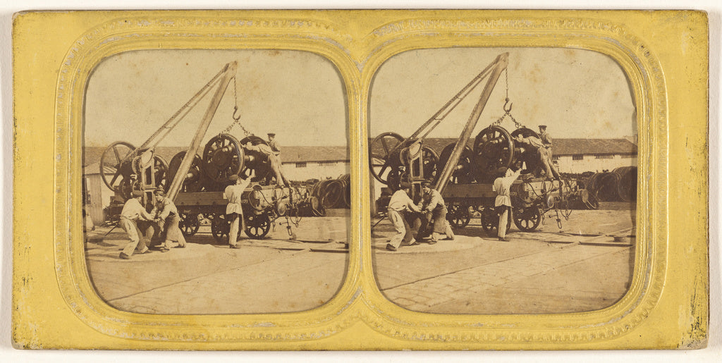 Unknown:[Men loading large iron wheels on platform], Poster Print Wall Art