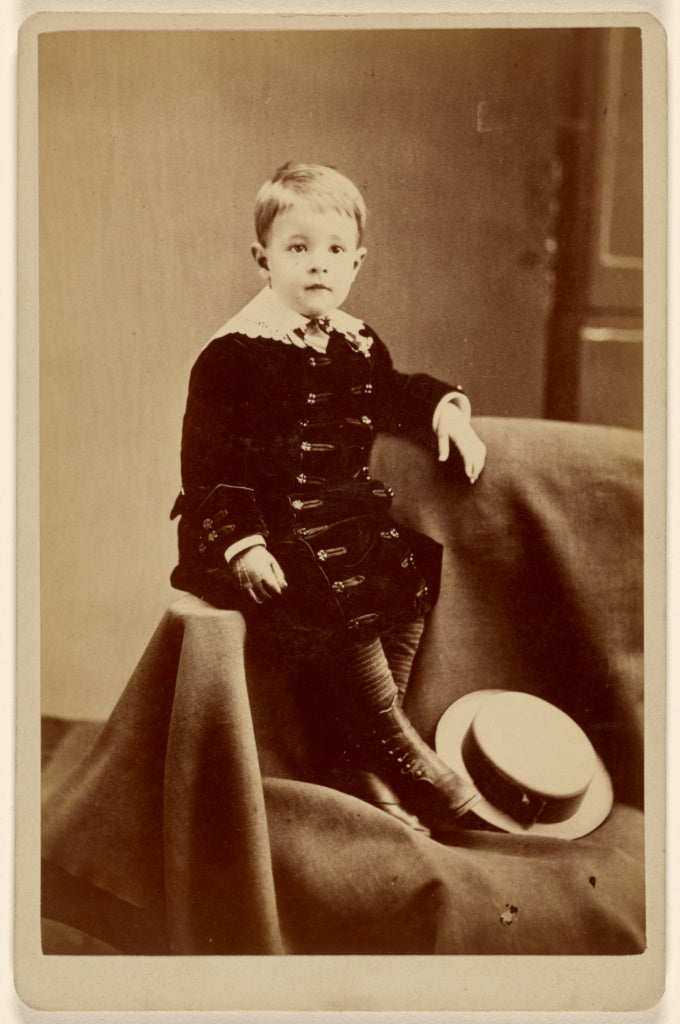 Unknown:[Little boy, seated on cloth, straw hat at feet], Poster Print Wall Art