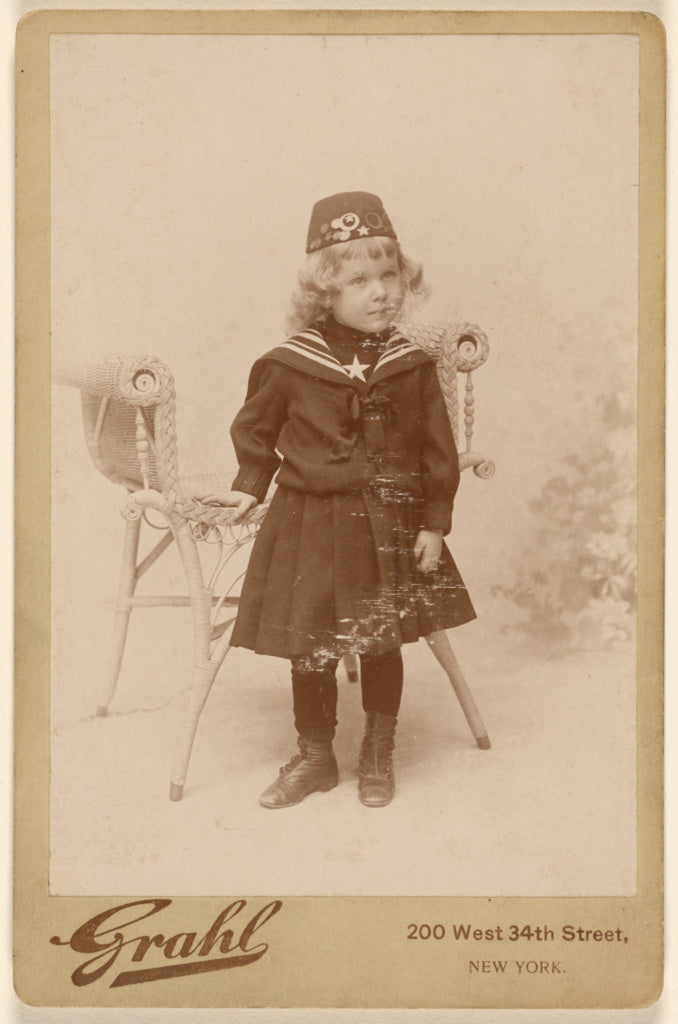 Grahl:[Little girl standing near a chair, wearing a fez], Poster Print Wall Art
