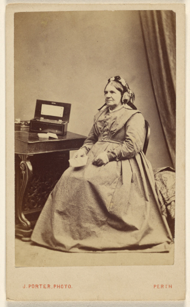 J. Porter:[Unidentified elderly woman seated near a table],16x12