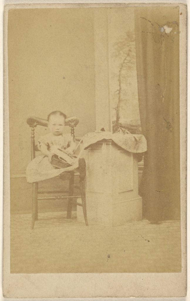 Unknown:[Unidentified little girl seated with a book in her ,16x12