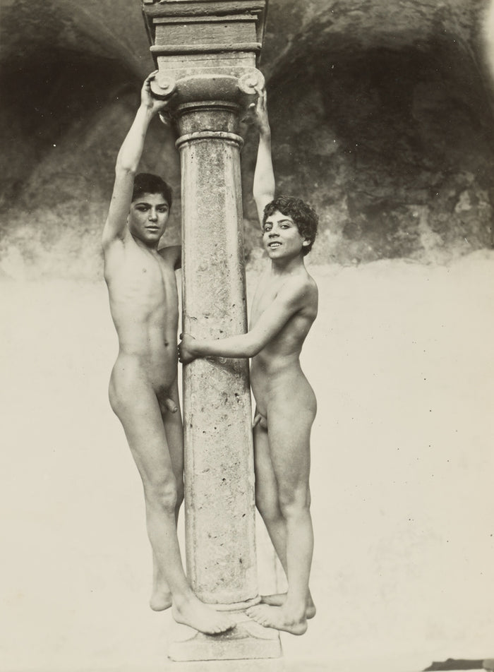 Baron Wilhelm von Gloeden:[Two Boys Holding onto a Column],16x12