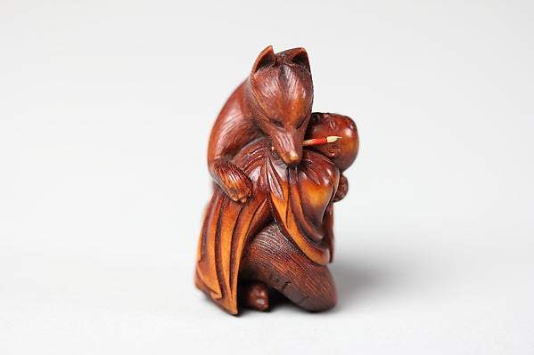 Netsuke of Fox Holding Baby and with Brush in Mouth from the K,  Poster Print Wall Art