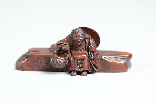 Netsuke of Woman Sitting on a Log 19th cent,  Poster Print