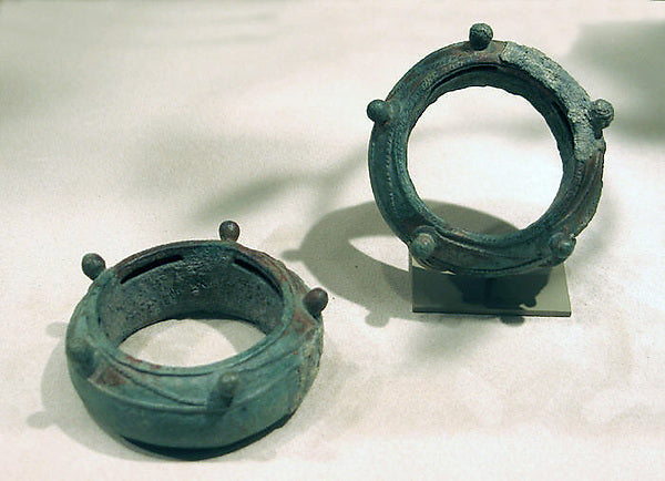 One of a Pair of Pellet Bangles with Textile Remnants 500 B.C.,  Poster Print