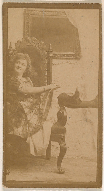 :Actress posing on chair with legs resting on armrest from t-16x12"(A3) Poster