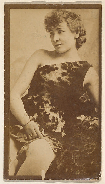 :[Actress in one-shouldered animal print seated] from the Ac-16x12"(A3) Poster