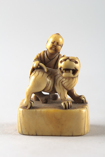 Netsuke of Boy with Dog 19th cent,  Poster Print