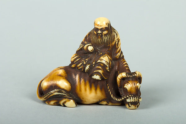 Netsuke of Man Sitting on a Recumbent Ox 19th cent,  Poster Print
