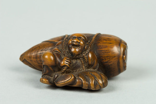 Netsuke of Old Man Carrying a Very Large Acorn 19th cent,  Poster Print Wall Art