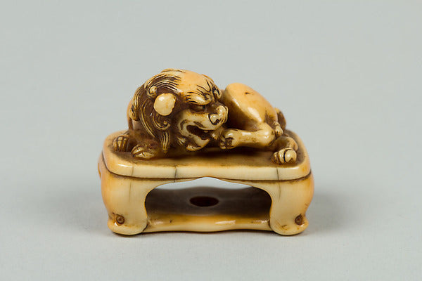 Netsuke of Lion on a Stand 19th cent,  Poster Print