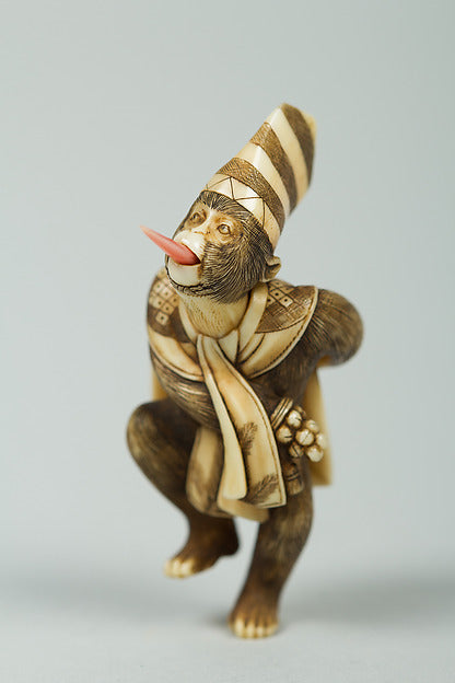 Netsuke of Monkey Wearing a Tall Cap and Carrying a Fan 19th c,  Poster Print