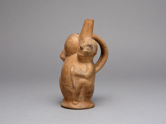 Handle Spout Vessel in the Form of a Seated Man Carrying a Jar: Lambayeque,16x12
